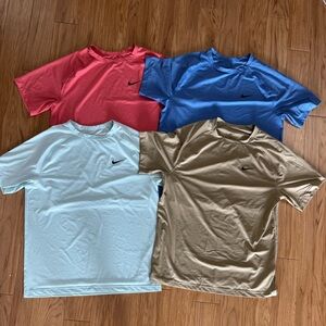 4 men’s Nike size medium performance shirts